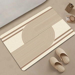 Detail of wabi-sabi diatom mud bath mat with geometric lines and non-slip rounded corners