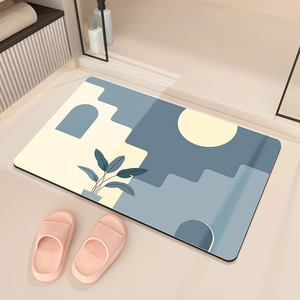 Close-up of diatom mud bath mat featuring modern geometric art and plant silhouettes