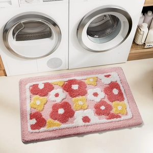 Detail of tufted floral rug with non-slip backing in modern laundry room setting