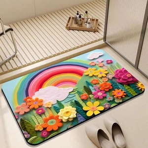 Absorbent floral diatom mud bath mat with 3D embossed rainbow design and non-slip surface