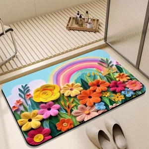 Detail of floral 3D embossed absorbent bath mat with rainbow and leaves on wooden floor