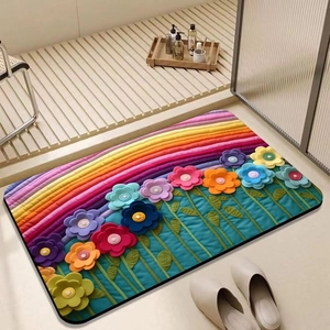 Detailed close-up of 3D floral diatom mud bath mat with colorful rainbow stripe design