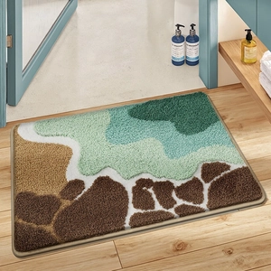 Abstract pattern faux cashmere bathroom mat with non-slip backing on light wood floor