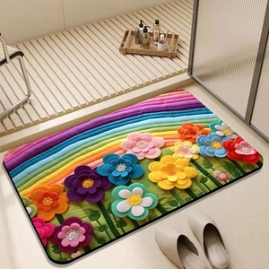 Detail view of 3D floral rainbow bath mat showing soft texture on a wooden floor