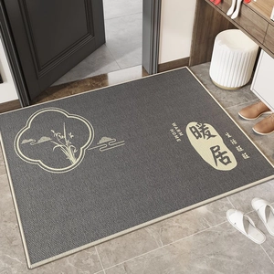 Detailed scene of dark grey absorbent entryway mat with orchid ink painting and warm home text
