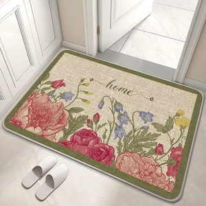 Detail of floral linen texture diatom mud bath mat with non-slip backing and home text