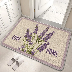 Detailed lavender floral diatomite bath mat with Love and Home text in a home setting