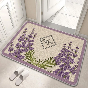 Detailed texture of lavender floral diatom mud bath mat with HOME WONDERFUL text