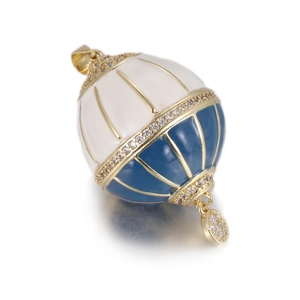Detailed view of a vintage blue and white enamel hot air balloon pendant with diamonds