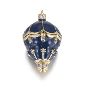 Detail showing Faberge-style blue enamel egg pendant with gold trim and inlaid zircons