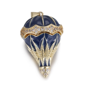 Detailed view of dark blue enamel hot air balloon pendant with white zircon inlays