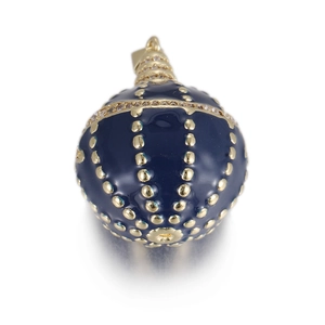 Macro detail of royal blue enamel egg pendant with gold dots and zircon-set bail