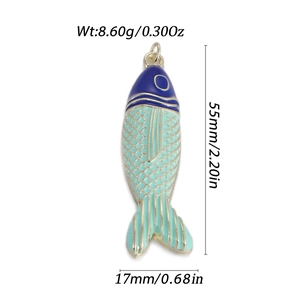 Detail showing tropical fish pendant dimensions of 55mm by 17mm with blue enamel inlay