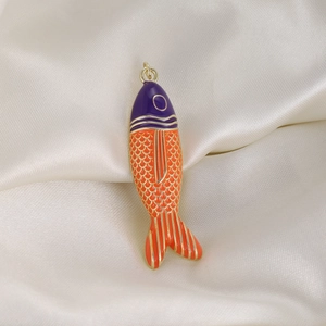Colorful tropical sea fish pendant in gold metal with vibrant orange and purple enamel