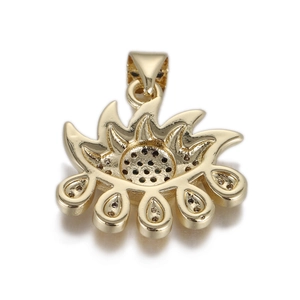 Macro detail of gold-plated evil eye pendant showing back side hollow structure and bail