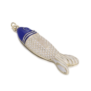 Detail of colorful tropical fish pendant with blue enamel and gold-plated scales