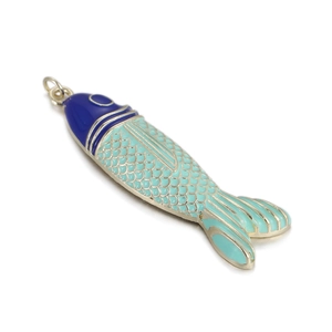 Detail of colorful tropical fish pendant with blue enamel head and green scales