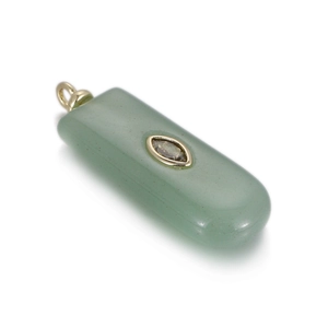 Macro view of rectangular green natural stone pendant with gold zircon setting for DIY jewelry