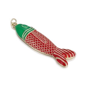 Macro detail of tropical fish pendant with red and green enamel and gold-tone plating