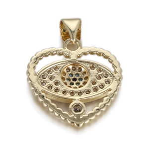 Detailed close-up of golden hollow heart evil eye pendant with crystal micro-pave setting