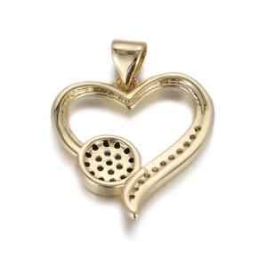 Macro shot of 14k gold plated heart pendant with hollow frame and honeycomb detail