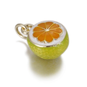 Macro shot of 3D orange fruit charm with green peel and orange enamel details