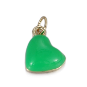 Close-up of a vibrant green enamel heart-shaped pendant with a shiny gold metal ring