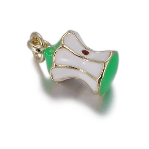 Detail of apple core pendant with green peel and white pulp for DIY jewelry making