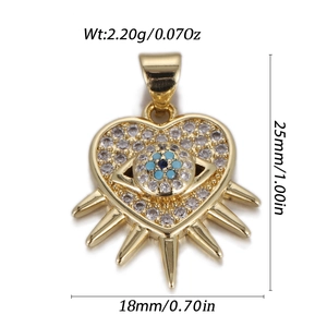 Golden heart Evil Eye pendant with white zircons and dimensions of 25mm by 18mm