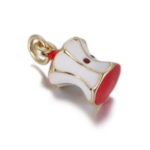 Detailed view of a red apple core mini pendant in gold-plated metal and enamel