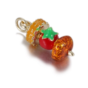Detailed view of a mini 3D fruit skewer charm with colorful enamel and gold finish