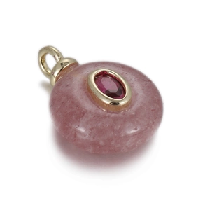 Detail of pink natural stone pendant with gold oval setting and faceted red gemstone
