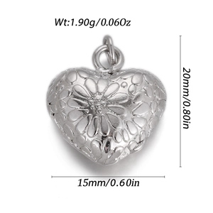 Detailed view of heart-shaped metal pendant with size specs and embossed texture