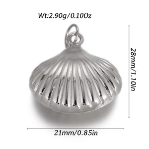 Detail view of silver shell pendant showing dimensions 28x21mm and 2.90g weight