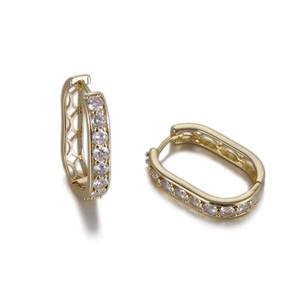 Détails de créoles ovales dorées avec zircons pavés et motif grillagé évidé à l'intérieur