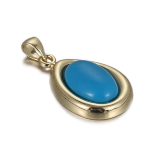 Detail van druppelvormige turquoise hanger met vergulde basis en gepolijste blauwe steen
