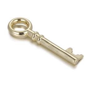 Detailed view of a gold-plated key pendant with a polished mirror finish for DIY jewelry