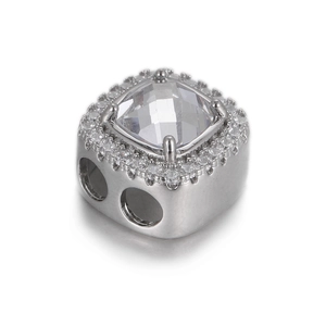 Macro view of square cut crystal charm with pavé zircon edge and large hole design