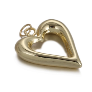 Detailed view of polished gold heart pendant with hollow design and double rings