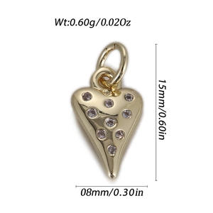 Detailed close-up of a 15mm gold heart pendant with cubic zirconia and 0.60g weight spec