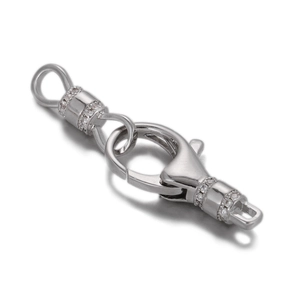 Detailed view of a lobster clasp pendant with cubic zirconia pave settings for jewelry DIY
