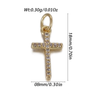 Detailed close-up of a gold cross pendant with cubic zirconia inlay and dimensions