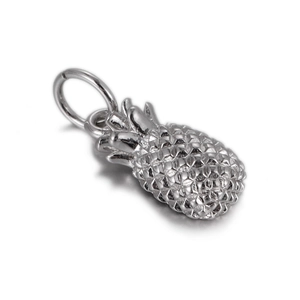 Close-up of a silver pineapple pendant with grid texture and top leaves for DIY jewelry