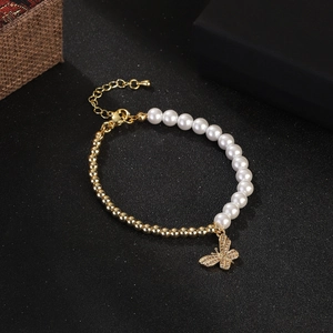 French vintage pearl and gold bead bracelet with crystal butterfly charm for women