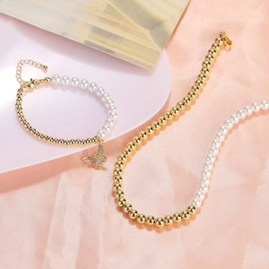 French vintage pearl and gold bead necklace and bracelet set with butterfly pendant