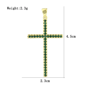 Detailed size specifications of the gold cross pendant featuring micro-pave green zircons