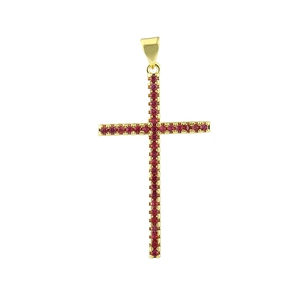 Macro view of gold plated cross pendant featuring pave set red cubic zirconia stones