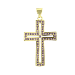 Detail of luxury gold cross pendant with intricate purple cubic zirconia pavé stones