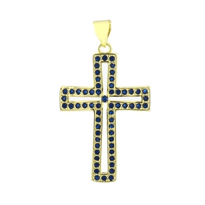 Detail of gold-plated hollow cross pendant with micro-set blue zircon stones