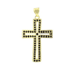Detailed macro view of a gold-plated cross pendant featuring micro-pave black gemstones